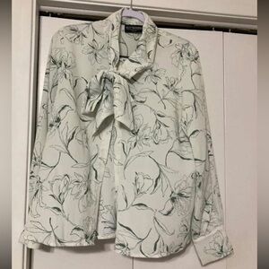 Kittenish button up shirt with tie neck